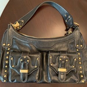 Black and gold Michael Kors handbag